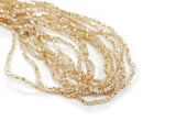 Glass beads, 2x3mm faceted rondelle, Opal with half coat light gold color | 玻璃珠, 2x3mm, 切面扁珠, 蛋白色 X 半邊鍍淺金色