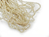 Glass beads, 2x3mm faceted rondelle, Translucent cornsilk, Lustre (#753L) | 玻璃珠, 2x3mm, 切面扁珠, 鍍面果凍淡黃 (#753L)