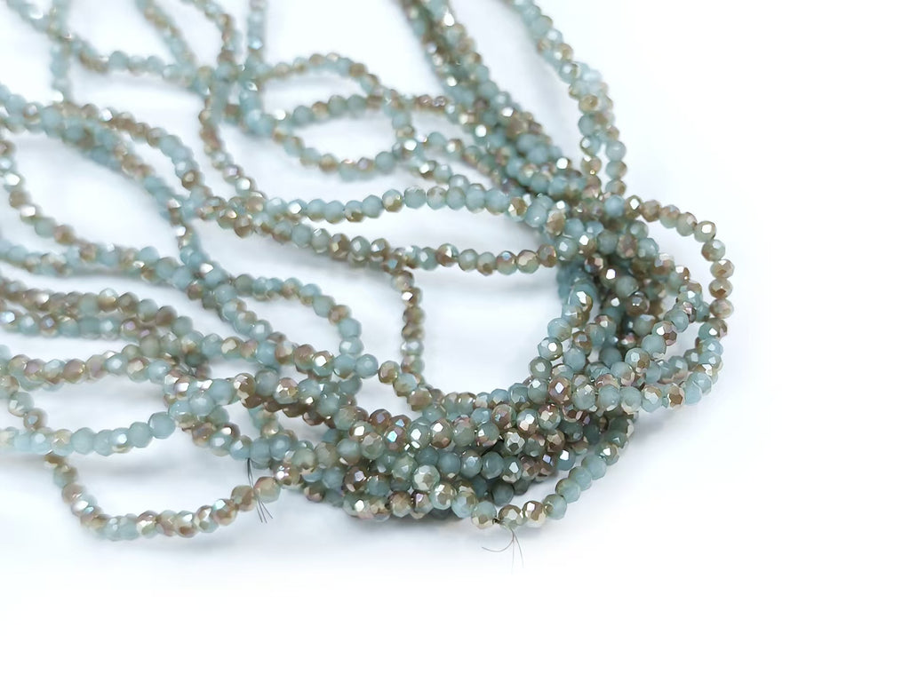 Glass beads, 2x3mm faceted rondelle, Translucent teal with half coat Topaz color | 玻璃珠, 2x3mm, 切面扁珠, 果凍孔藍 X 半邊鍍琥珀色