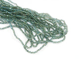 Glass beads, 2x3mm faceted rondelle, Iridescent Blue-green (#82) | 玻璃珠, 2x3mm, 切面扁珠, 藍綠彩 (#82)