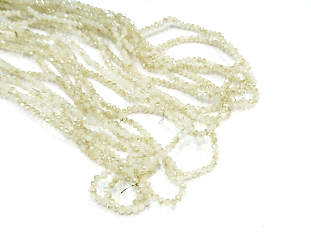Glass beads 3x3.5mm faceted rondelle, opaque off-white with half coat Jasmine yellow (#758) | 玻璃珠, 3x3.5mm, 切面扁珠, 蛋白X半鍍淡黃 (#758)