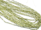 Glass beads, 2x3mm faceted rondelle, pale green (dyed) | 玻璃珠, 2x3mm, 切面扁珠, 淡綠色 (染色)